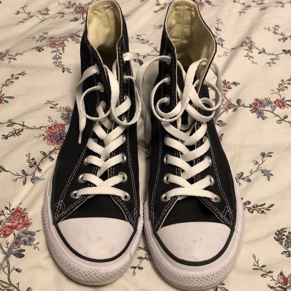 Black and white high top converse